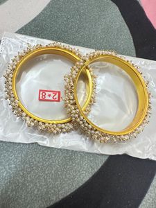 sukkhi women kada-stacks gold bangles