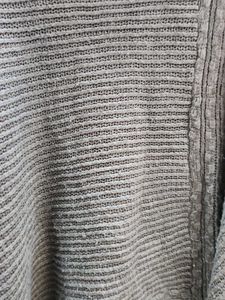 Stylish Knitted Poncho with Fringes