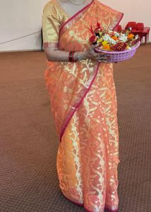 Elegant Orange Saree with Gold Motifs
