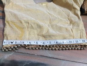 dark brown lehga with golden duppatta and blouse