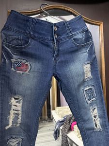 Distressed Patchwork Denim Jeans