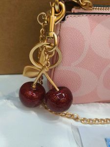 Coach Nolita Gift packaging with charm&amp; pouch 🩷