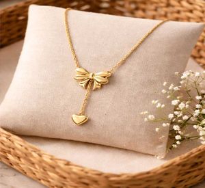 Gold Bow &amp; Heart Necklace