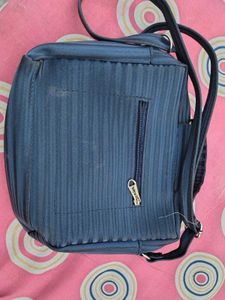 Stylish Blue Handbag with Bow Accent