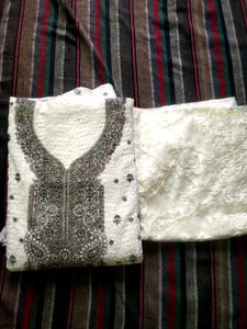 Elegant White Kurta Set with Intricate Embroidery
