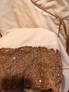 Elegant Cream Kurta with Embroidered Hem