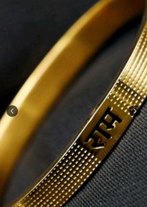 Elegant Gold Bangle with Ram Engraving