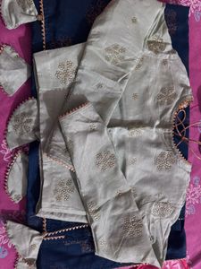 Elegant Teal Saree with Embellished Blouse