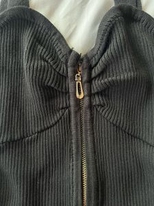 Stylish Black Ruffled Zipper Top
