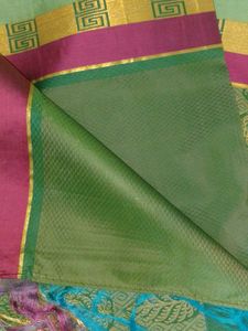 Elegant Green Saree with Gold Leaf Motifs