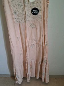 Peach Embroidered Dress With Matching Jewellery