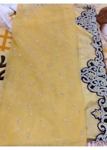 Elegant Yellow Embellished Saree