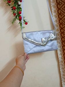 Silver Sequin Bow Clutch