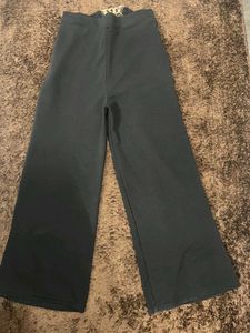 Stylish Wide-Legged Pants with Gold Chain Detail