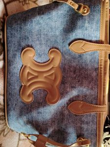 Stylish Denim Handbag with Leather Accents