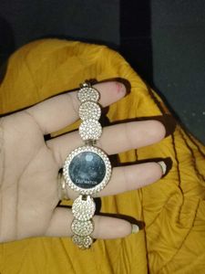 Set of Golden Bangles and 1 singe bange watc