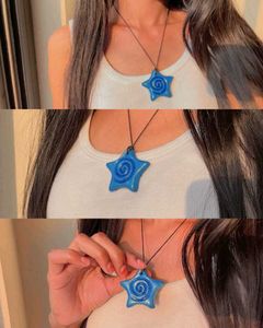 Clay jewellery/necklace/charm
