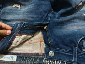 Calvin Klein trendy Distressed Blue Jeans for sale