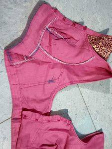 Elegant Pink Blouse with Embellished Sleeves