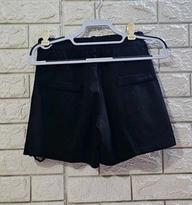 Chic Black Eyelet Shorts with Embellishments