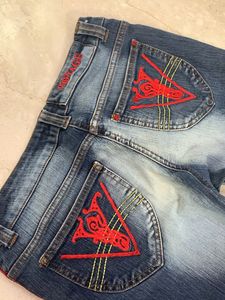 Blue Flare Jeans with Red Trim