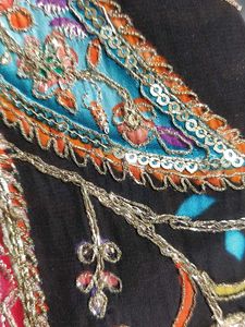 Embroidered black material -1 Metre