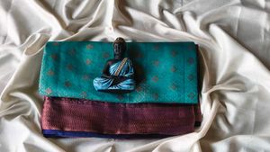 Elegant Teal Saree with Brocade Border