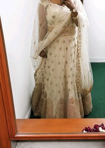Exquisite Cream & Gold Embellished Lehenga Choli