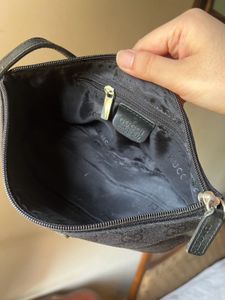 Gucci Monogram boat pochette bag