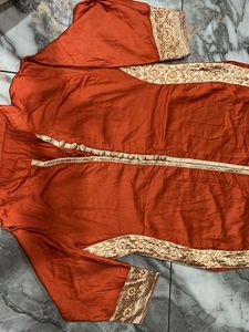 Orange Embroidered Kurta and skirt