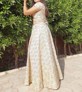 Cream Colour Lehenga Choli With Green Dupatta