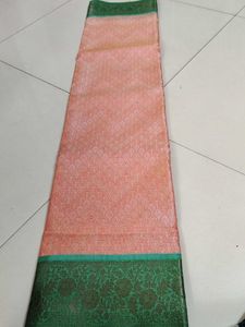 Elite orange green saree...