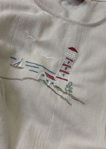 Beige Embroidered Lighthouse Sleeveless Top