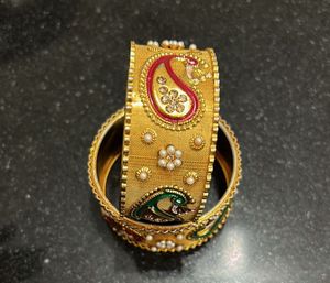 Vintage Gold-Tone Peacock Bangles