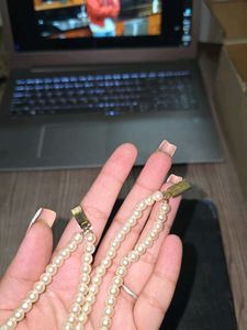 Red, green and white pearl necklace