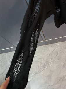 Distressed Black Knit Sweater