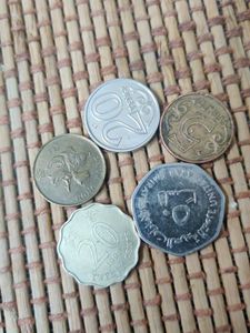 Collection of Assorted Coins from 4 countries .