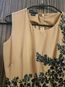 Elegant Beige Jumpsuit with Embellishments