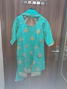 Turquoise teal color suit with Kundan
