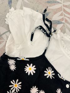 Chic Daisy Print Black Dress with Puff Sleeves