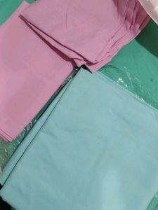 Turquoise Bed Sheet Set with Pink Pillows
