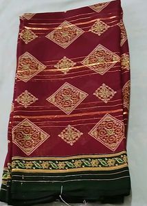 Elegant Maroon Saree with Gold Motifs