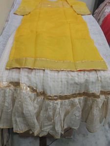 Elegant Yellow Kurta with Cream Skirt