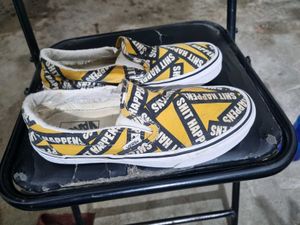 Authentic  Slip-On "s*it Happens" Shoes
