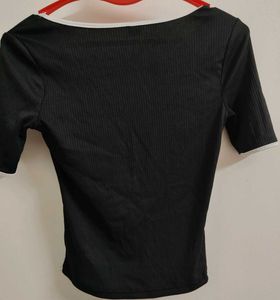 Ribbed Black Top with White Trim