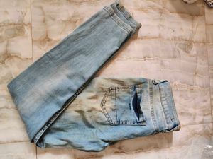 Ripped Light Wash Denim Jeans