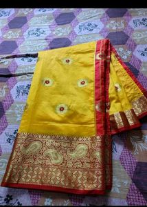 Vibrant Yellow Silk Saree with Red Border