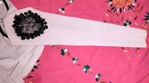 Embellished Peplum Top