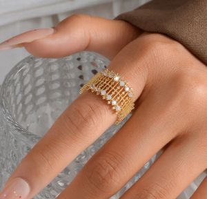 Elegant Gold Tone Ring with Crystals