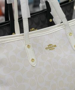 Coach Monogram Tote Bag rakhi offer
